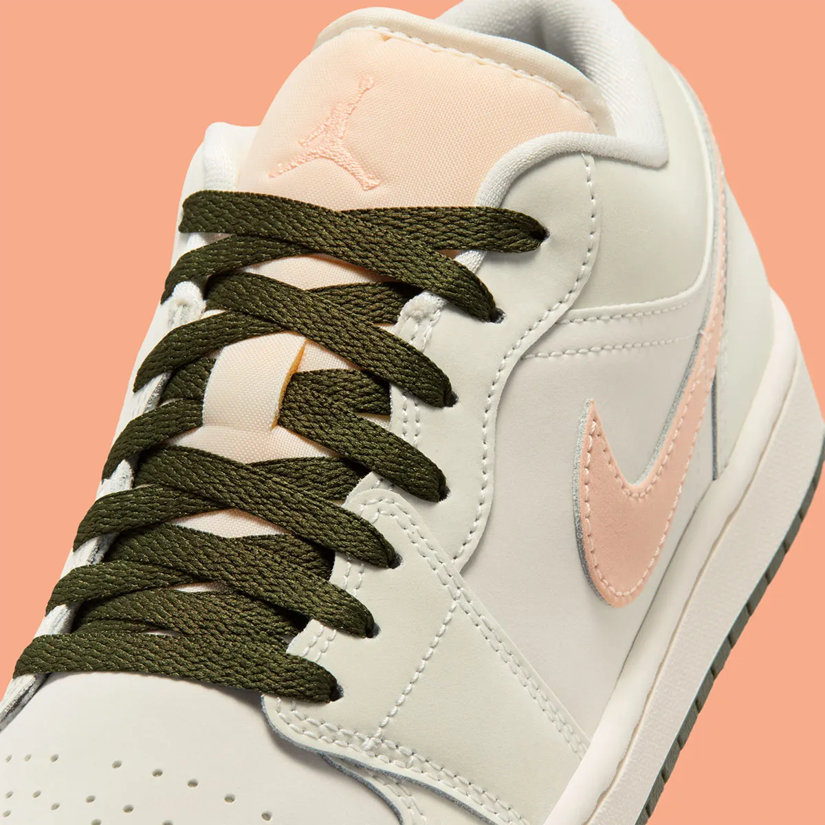 The Air Jordan 1 Low Adds A “Crimson Tint”