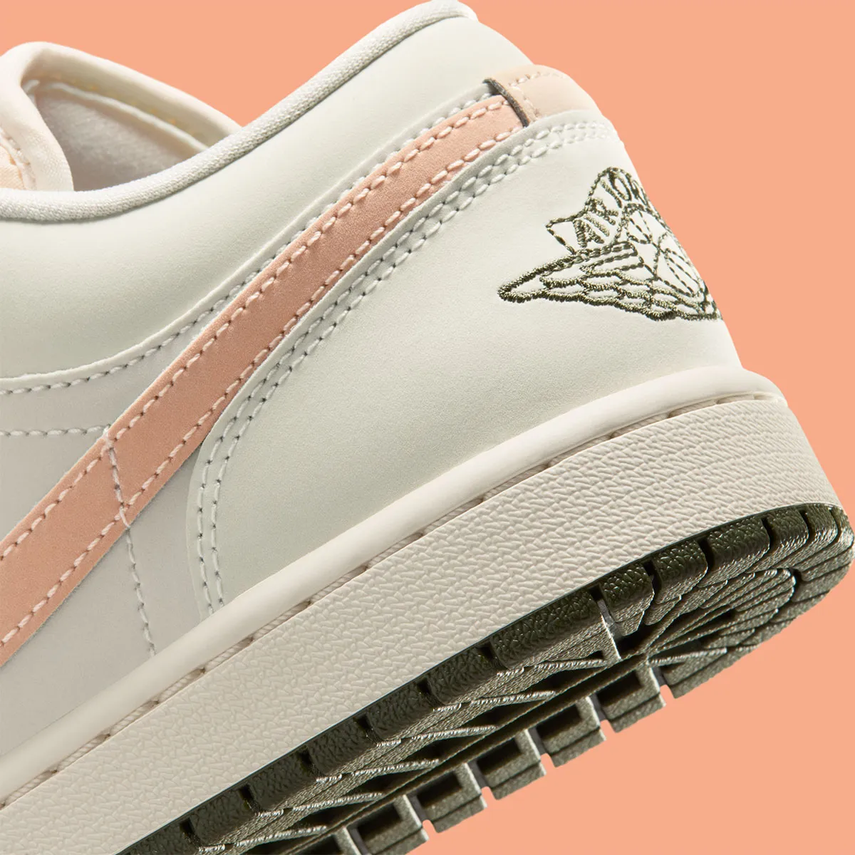 The Air Jordan 1 Low Adds A “Crimson Tint”