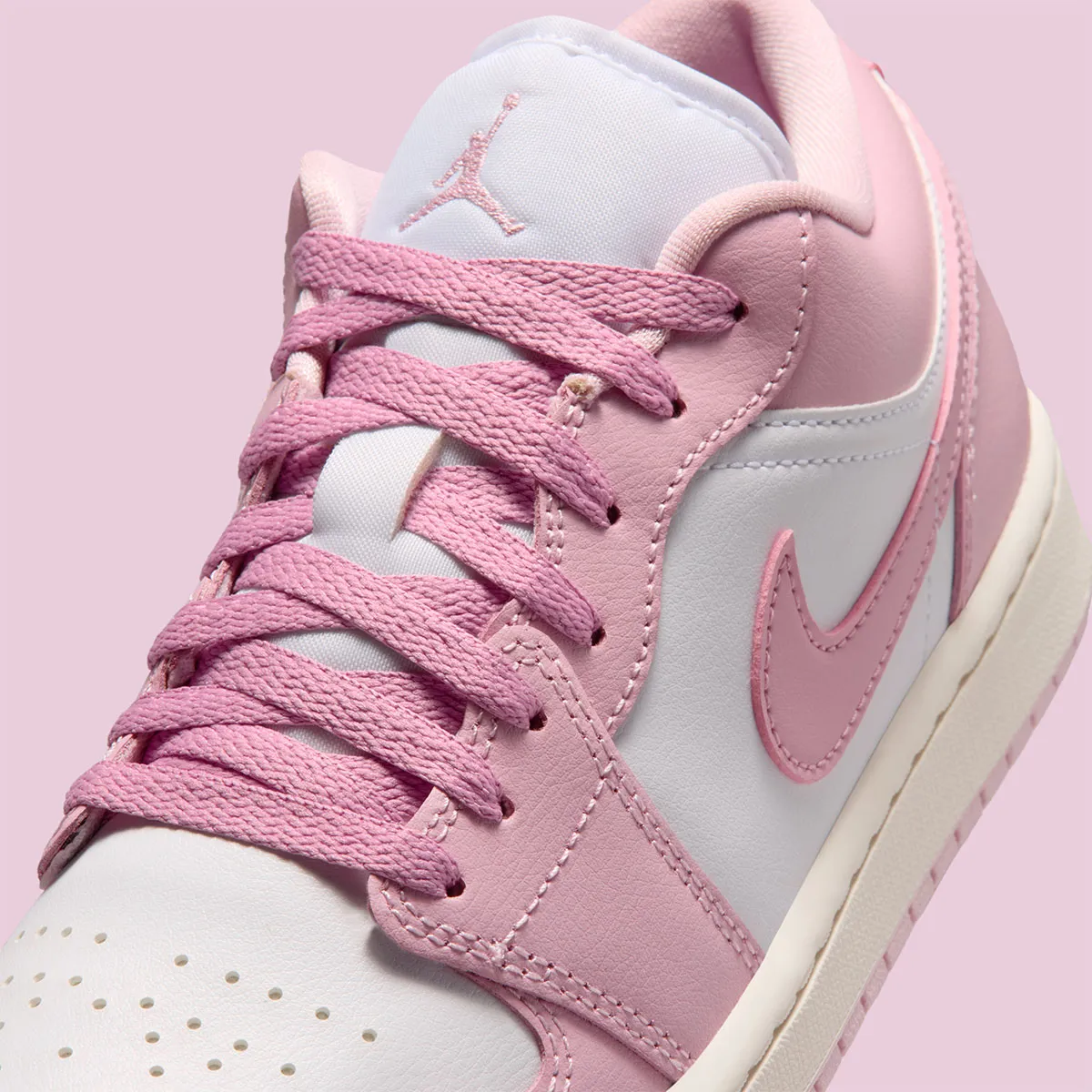 The Air Jordan 1 Shares “Iced Carmine” Across The Mid And Low