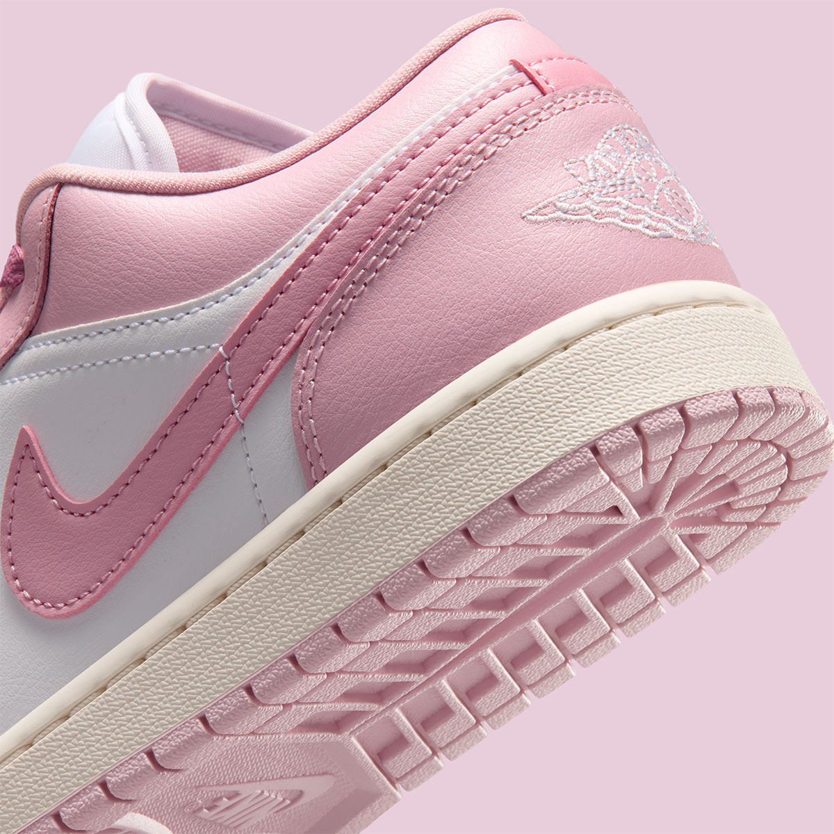 The Air Jordan 1 Shares “Iced Carmine” Across The Mid And Low