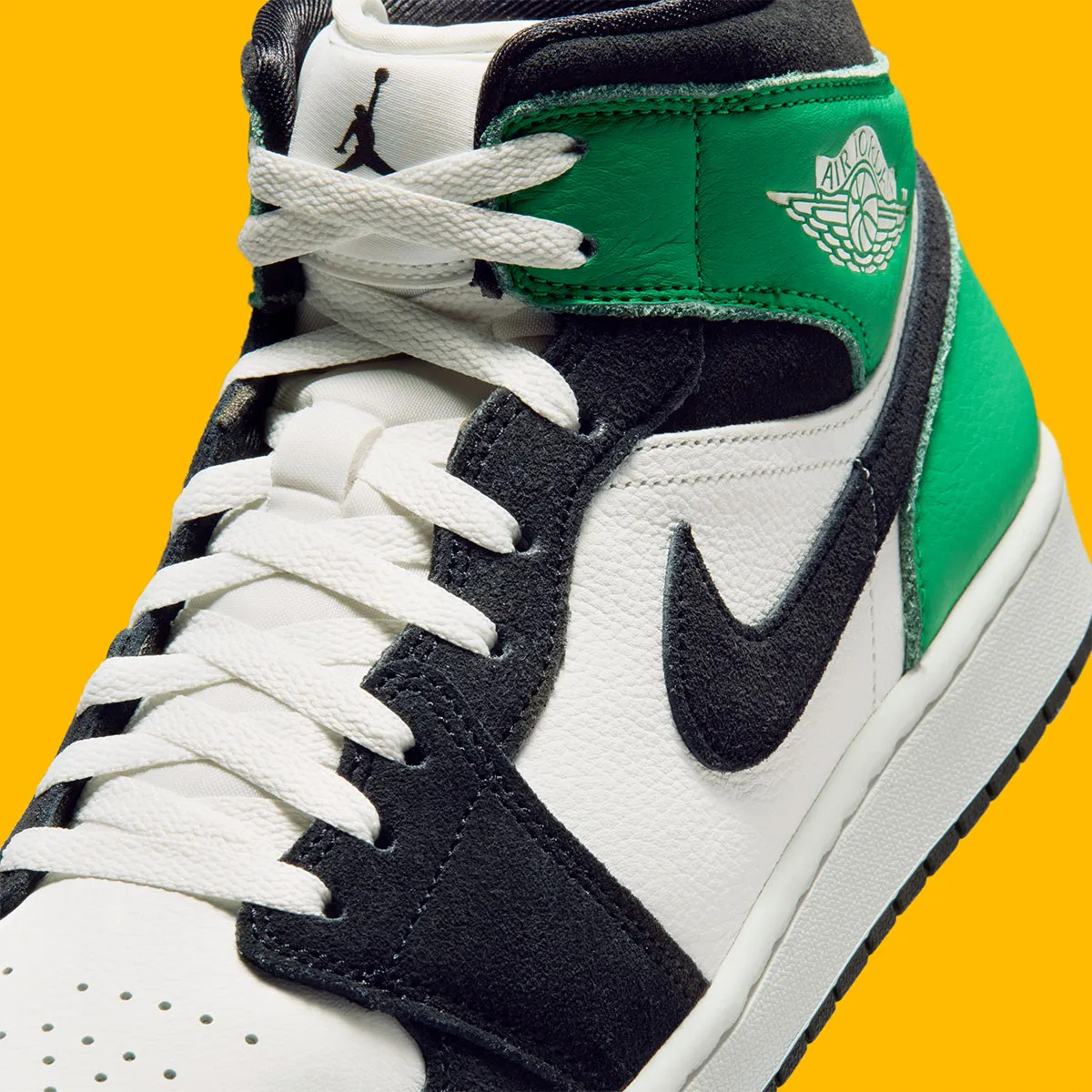 The Fan Favorite Mini Swoosh Lands On The Air Jordan 1 Mid “Lucky Green”