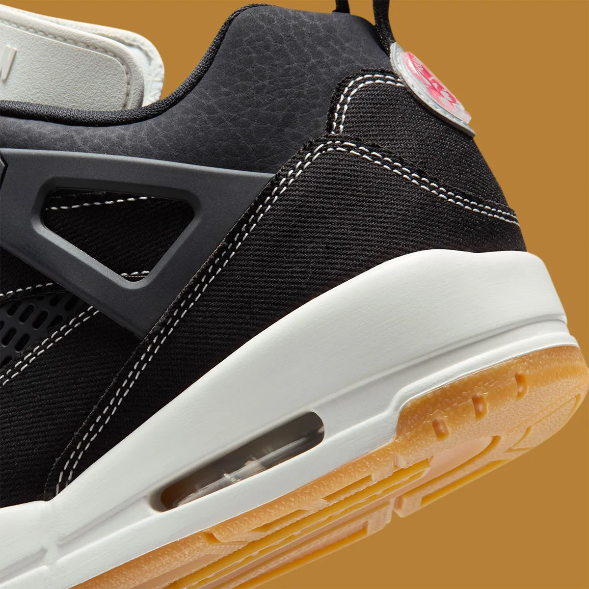 The Jordan Spiz’ike Low Slips Into Black “Denim”