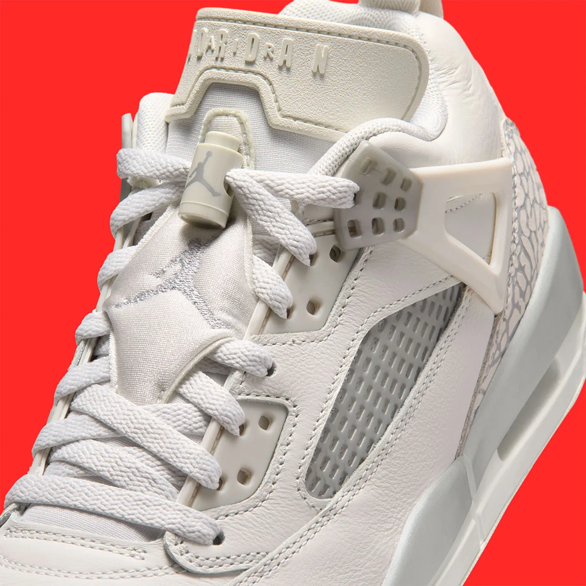 Monochrome Blocking Defines The Jordan Spiz’ike Low “Swan”