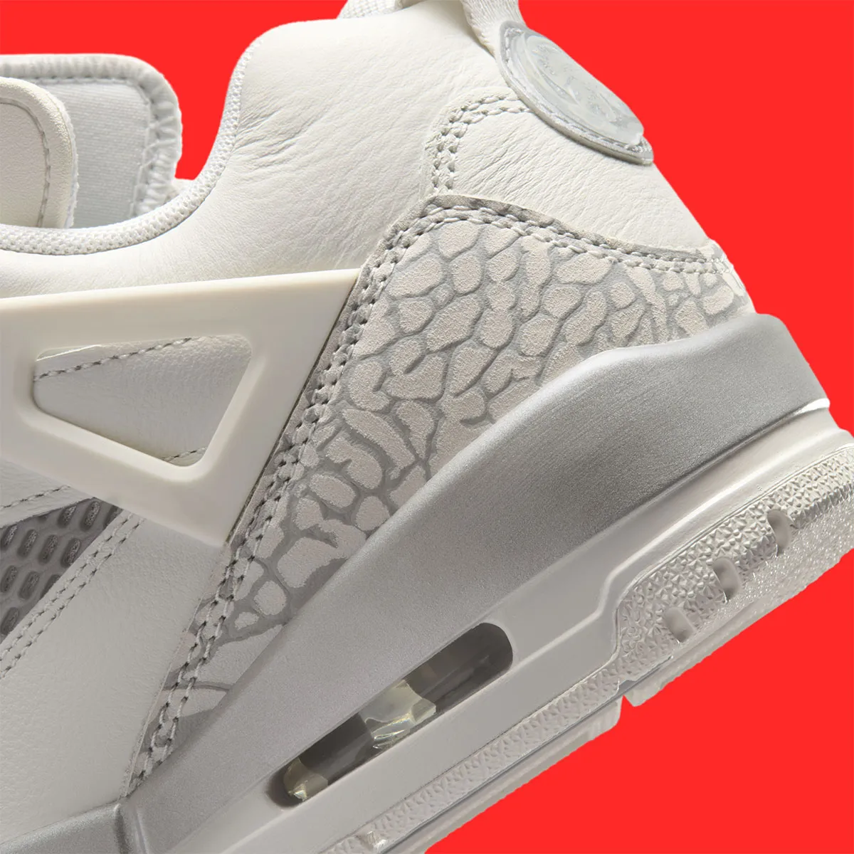 Monochrome Blocking Defines The Jordan Spiz’ike Low “Swan”