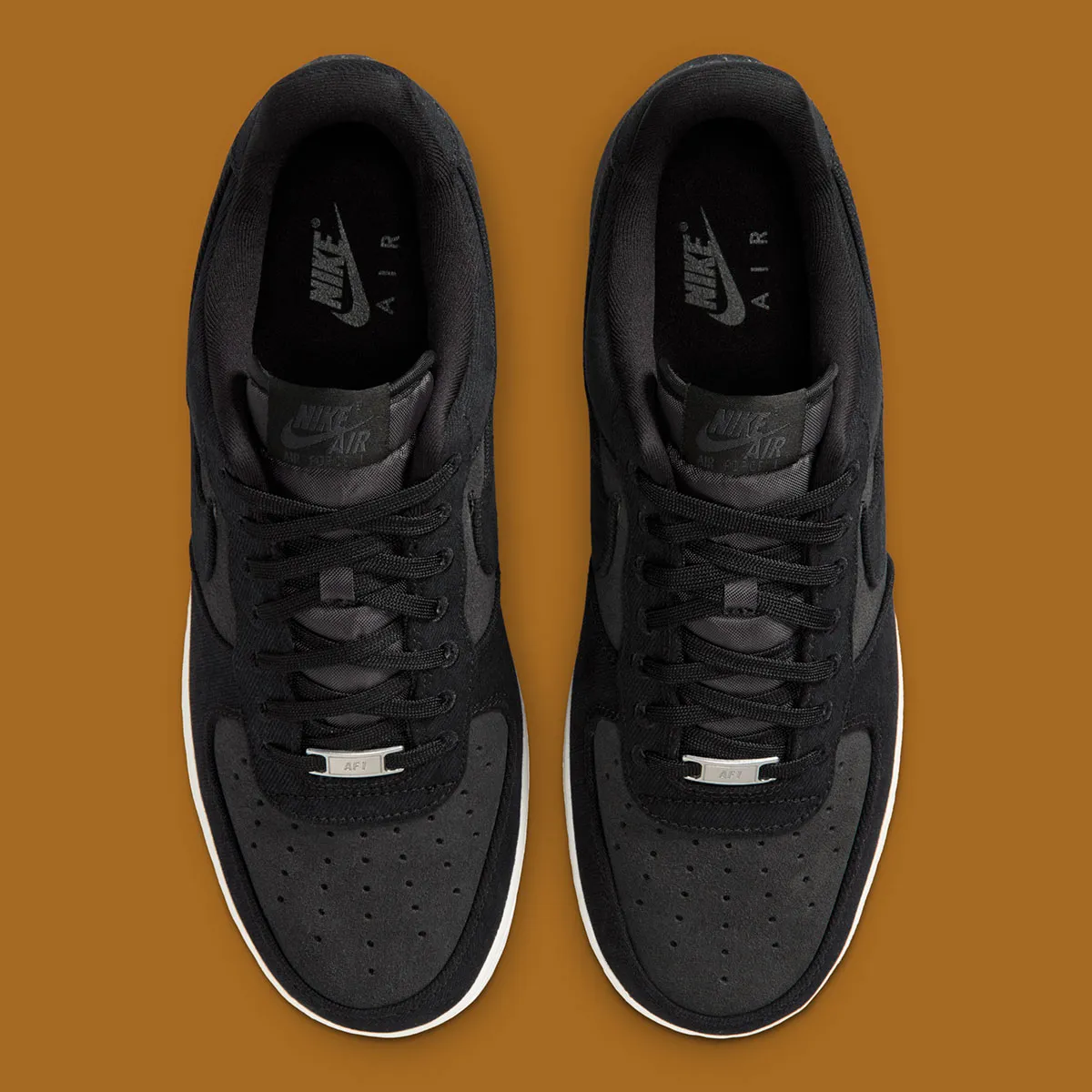 Black Canvas Wraps The Nike Air Force 1 Low
