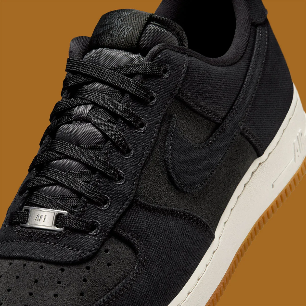 Black Canvas Wraps The Nike Air Force 1 Low