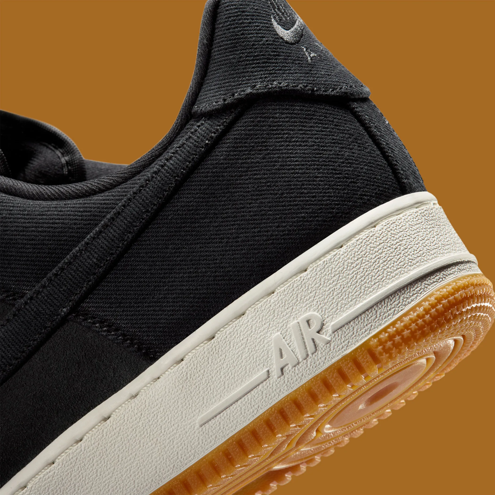 Black Canvas Wraps The Nike Air Force 1 Low