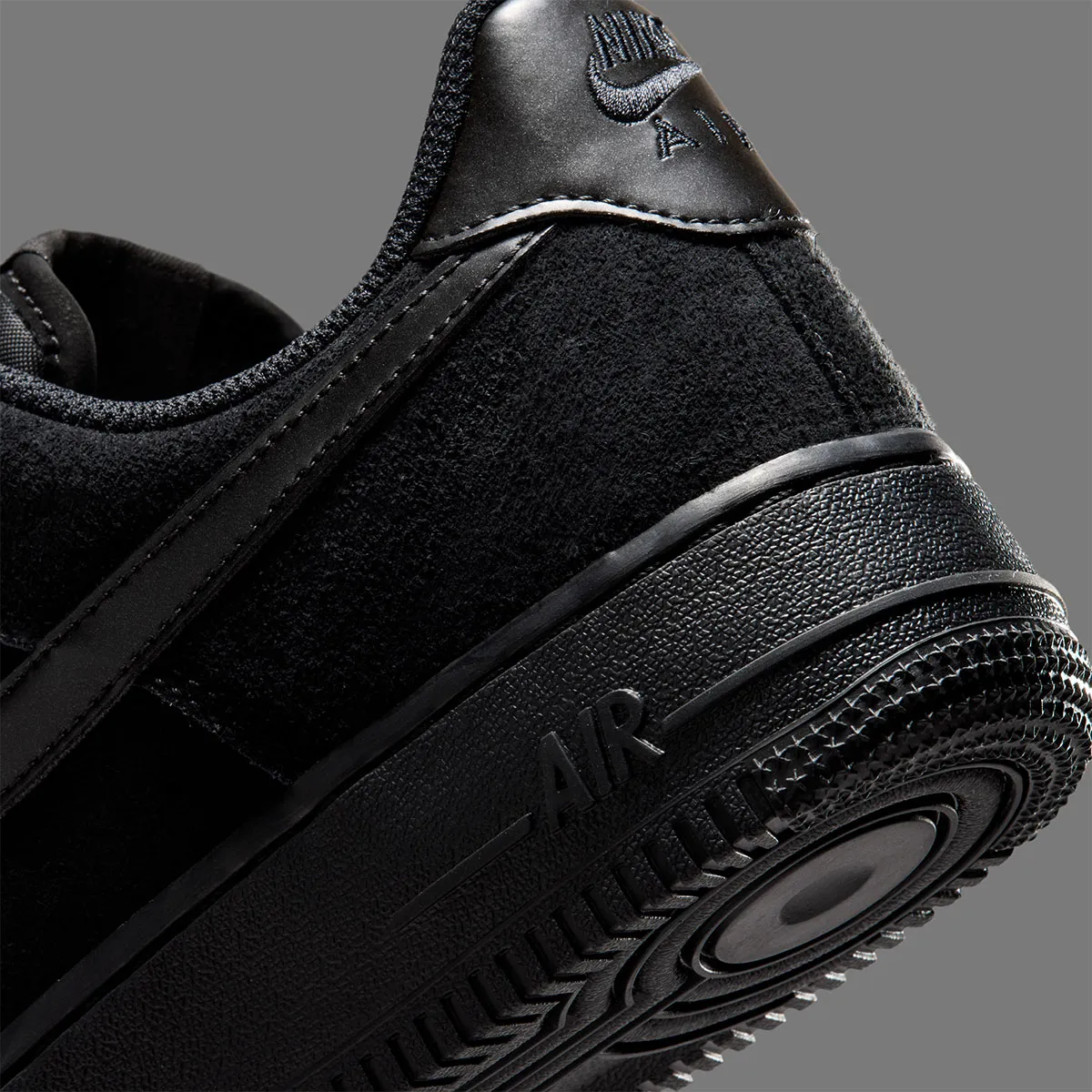 The Nike Air Force 1 Low Pins Metallic Branding On Two Suede Looks