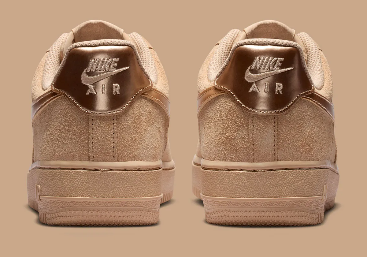 The Nike Air Force 1 Low Pins Metallic Branding On Two Suede Looks