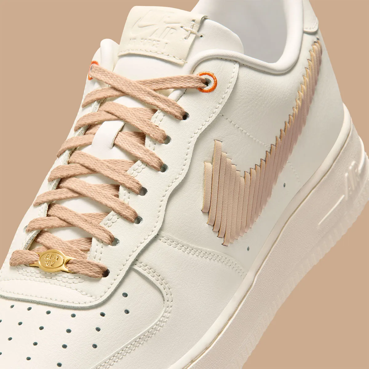 The Nike Air Force 1 Mimics Baseball Gloves With A Woven Leather Swoosh