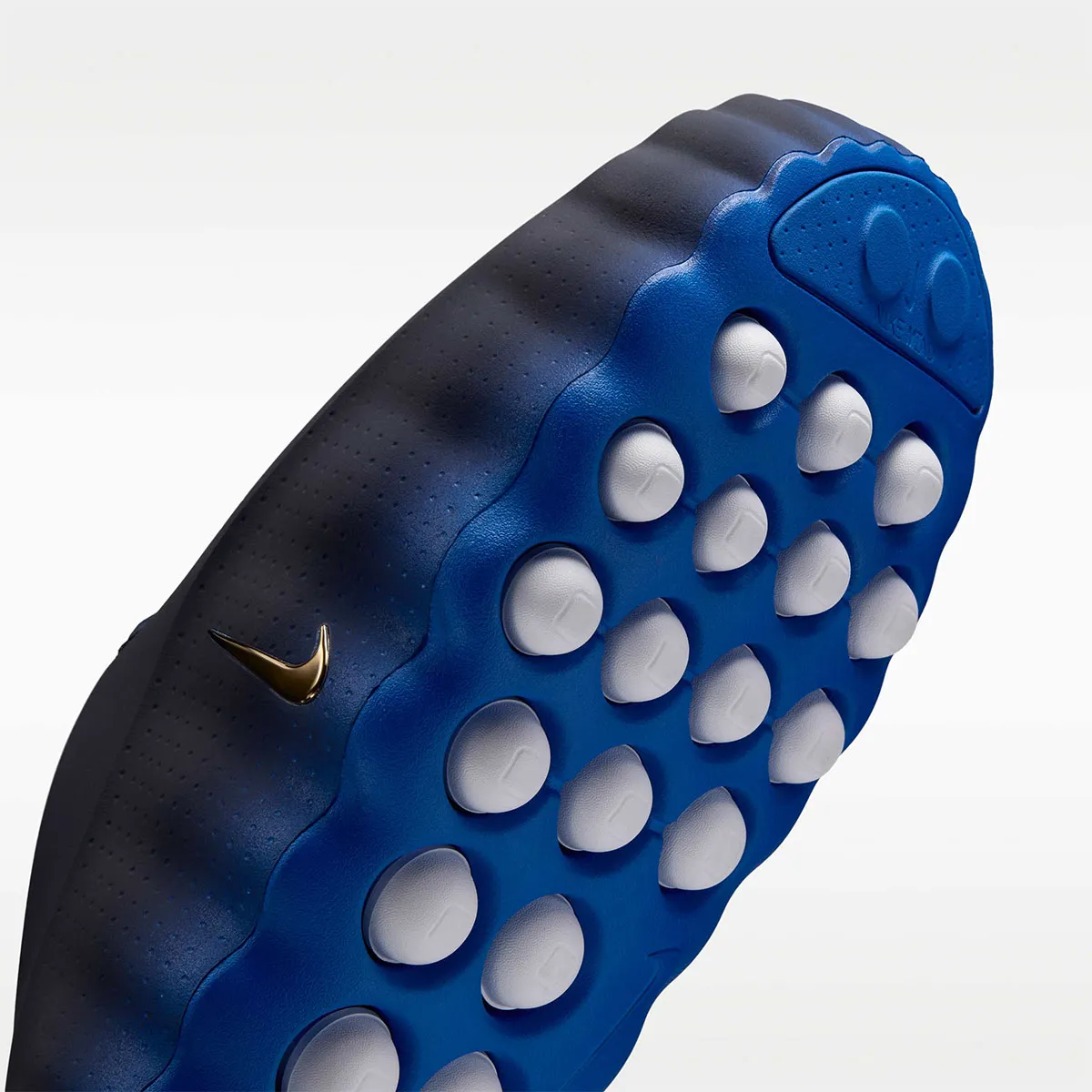 “Blackened Blue” Gradients Set On The Nike Mind 001