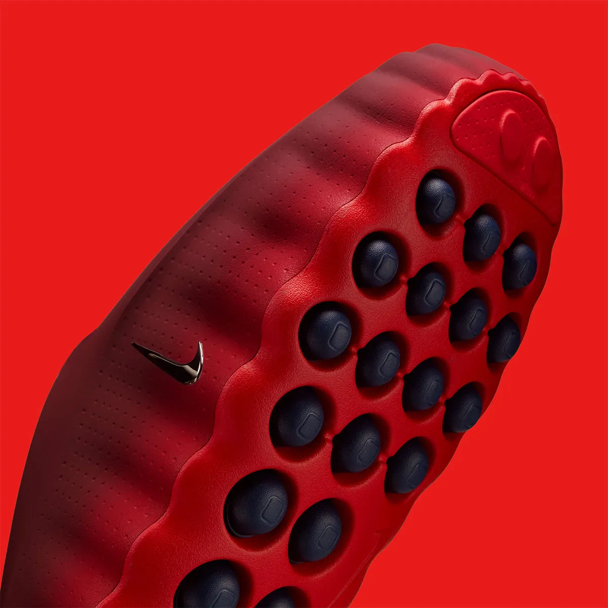 The Nike Mind 001 Dons “Team Red”