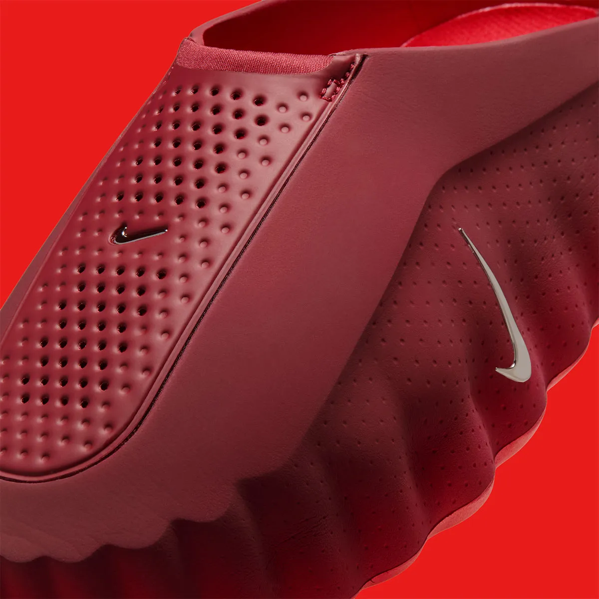 The Nike Mind 001 Dons “Team Red”