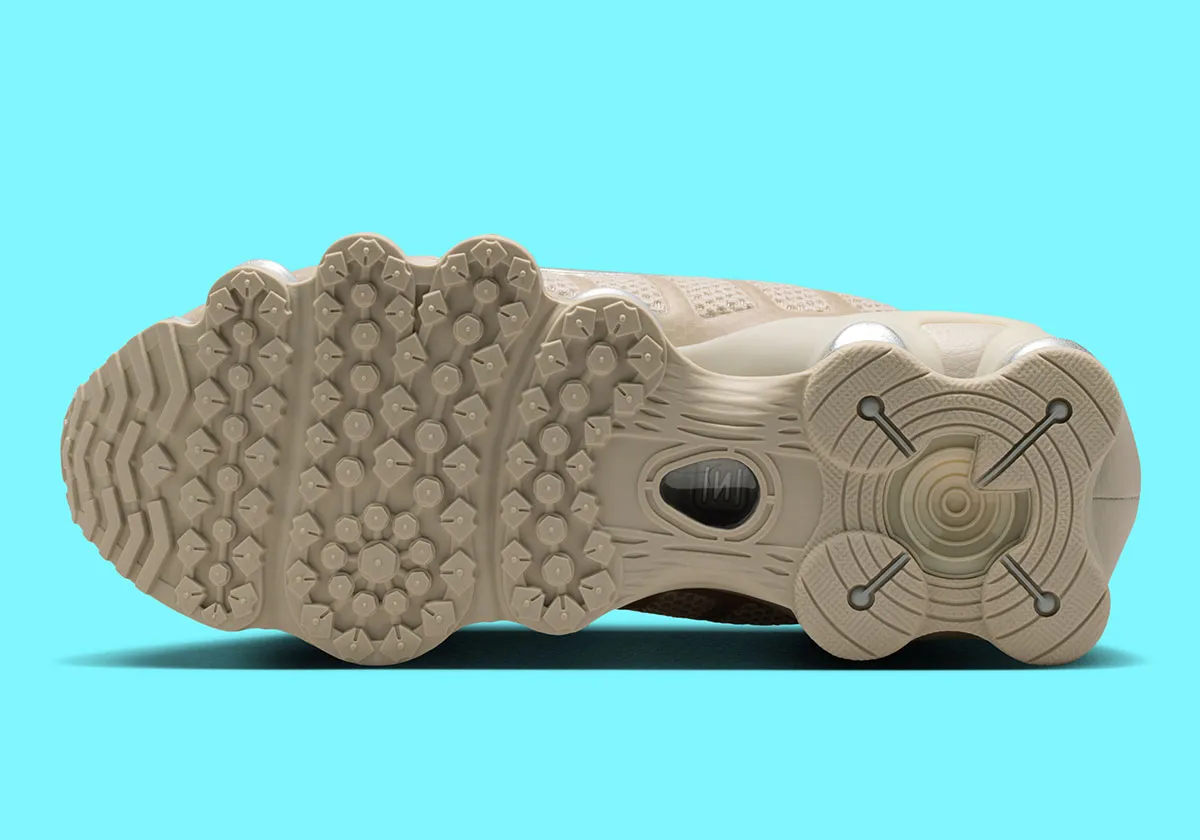 Cream And Metallic Silver Clash On The Nike Shox TL