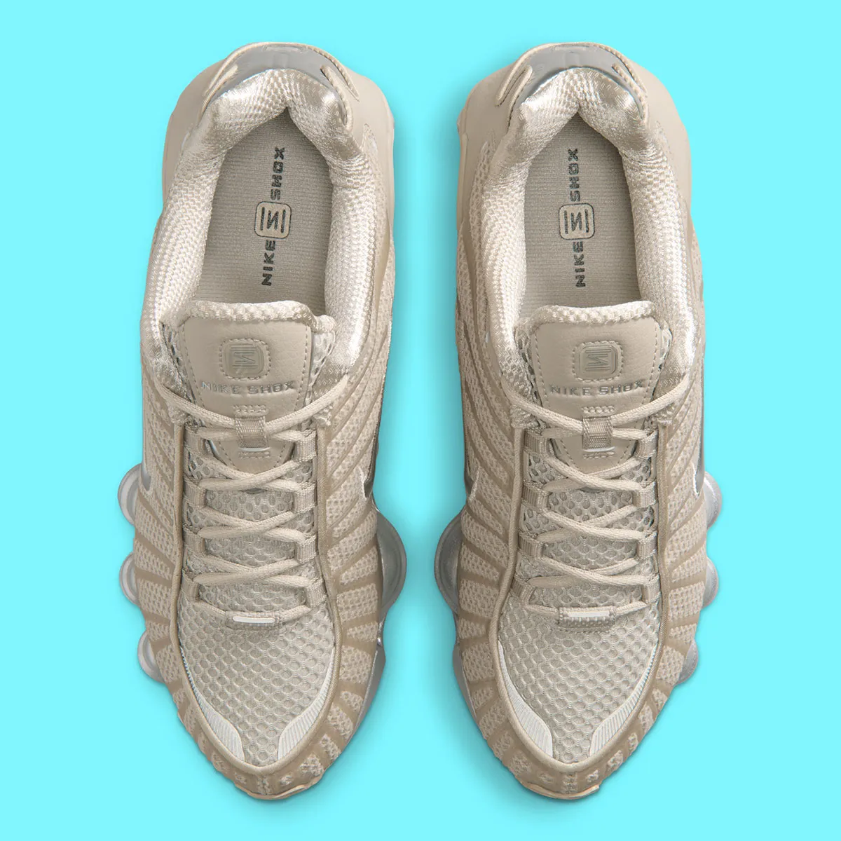Cream And Metallic Silver Clash On The Nike Shox TL