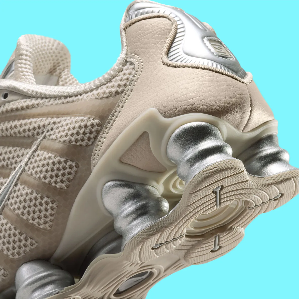 Cream And Metallic Silver Clash On The Nike Shox TL